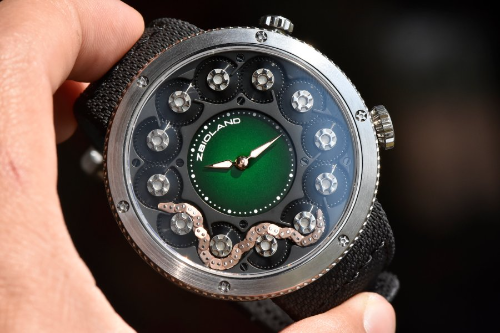 SNAKE Watch by Zbioland: Uses an independent spring-loaded wind-up system that powers the watch for up to 38 hours.